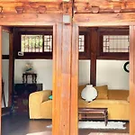 A Traditional Korean House With A Yard